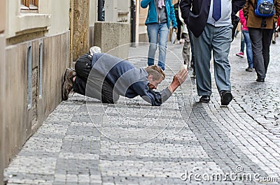 Art of street begging in Prague Editorial Stock Photo